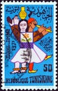 TUNISIA - CIRCA 1971: A stamp printed in Tunisia from the `Stamp Day` issue shows the musicians of Kerkena, circa 1971.