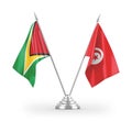Tunisia and Guyana table flags isolated on white 3D rendering