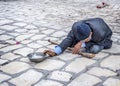 Sousse. Beggar on the square of the old city Medina