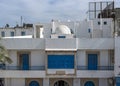 Balconies on the facades of houses in Sousse. Royalty Free Stock Photo