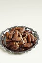 Tunisian Dates or Kurma Tunisia isolated on Cream Background for Breaking the Fast or Buka Puasa