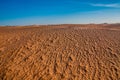 Tunisian desert landscape with blue sky. Dunes background Royalty Free Stock Photo