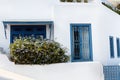 Tunisian eastern courtyard houses with white walls and blue windows doors Royalty Free Stock Photo