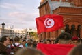 Tunisian football fans with flag on red Square. Football world Cup.