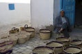 North Africa. Tunisia, Nabeul. Seller wicker basket