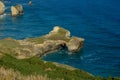 Tunnel Beach - southwest of the city centre of Dunedin. Tunnel Beach has sea-carved sandstone cliffs, rock arches and caves. New