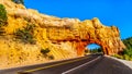 Tunnel carved in the Red Sandstone mountains of Red Canyon for Highway 12 between Highway 89 and Bryce Canyon National Park, Utah Royalty Free Stock Photo