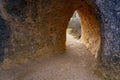 Tunnel formed in the stone rock eroded by time in the Enchanted City Royalty Free Stock Photo