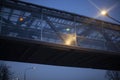 Tunnel at night. Pedestrian crossing above the ground