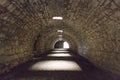 Tunnel of old castle with the light at the end Royalty Free Stock Photo