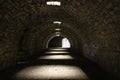 Tunnel of old castle with the light at the end Royalty Free Stock Photo