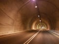 Tunnel road street car lights highway traffic Royalty Free Stock Photo