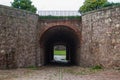 Tunnel in stone wall