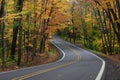 Tunnel of trees in autumn time along scenic byway M41 in Keweenaw peninsula in Michigan upper peninsula Royalty Free Stock Photo