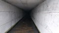 The tunnel through which the city`s sewage flows. Dark passage without end