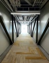 Tunneled hallway walking into the light. Royalty Free Stock Photo