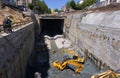 Tunneller worker installing fixture in underground subway metro construction site in Sofia, Bulgaria.