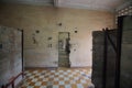 Room with plaid floor in Tuol Sleng Genocide Museum