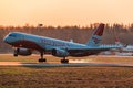 Tupolev 214 Red Wings Airlines touch down at sunset