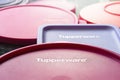 Tupperware lids. Close-up of Tupperware brand lids with logo. Textured image with shallow depth of field. Ukraine. Kyiv. 06.02. Royalty Free Stock Photo