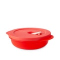 Tupperware plastic container. Plastic red food box with microwave valve closed lid isolated on white background. Food container. Royalty Free Stock Photo