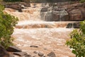 Turbid water of tropical waterfall after hard rain Royalty Free Stock Photo