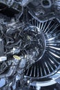 Turbine Engine. Aviation Technologies. Aircraft jet engine detail during maintenance. Blue toned. Royalty Free Stock Photo