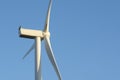 Turbine of a wind power generator on a background of blue sky. Alternative energy sources. Electricity industry Royalty Free Stock Photo