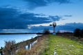 Turbine windmill by lake, Groningen