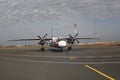 Turbo propelled aircraft on parking apron in the airport Royalty Free Stock Photo