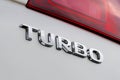 Turbo lettering on car rear Royalty Free Stock Photo