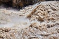 Turbulent muddy mountain river.