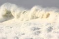 Turbulent ocean wave with sea spray tossed up