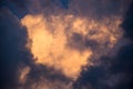 Turbulent Storm Clouds Backlit by the Setting Sun Royalty Free Stock Photo