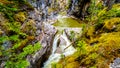 The turbulent waters of the Maligne Canyon flowing through the deep Maligne Canyon in Jasper National Park