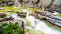 The turbulent waters of the Maligne Canyon flowing through the deep Maligne Canyon in Jasper National Park