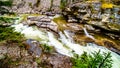 The turbulent waters of the Maligne Canyon flowing through the deep Maligne Canyon in Jasper National Park