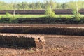 Turf block piles, industrial peat extraction on a raised bog lan