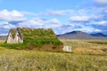 Turf house and panorama of Iceland - Northen Europe Royalty Free Stock Photo