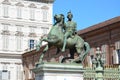 Turin Ã¢â¬â equestrian statue dedicated to Castore and Polluce in Castle square with the Royal Palace in the background