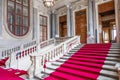 Turin, Italy - Circa January 2022: red carpet in Royal Palace - luxury elegant marble stairway