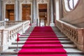 Turin, Italy - Circa January 2022: red carpet in Royal Palace - luxury elegant marble stairway