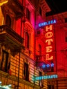 Hotel and Ristorante Neon signboard in an Italian street at night. Turin, Italy