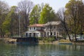 Cerea Rowing Club building and terrace with people, Po river in Piedmont, Turin, Italy