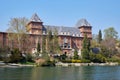 Valentino castle and Po river in a sunny day, clear blue sky in Piedmont, Turin, Italy