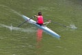 Turin, Italy May 9, 2014 athletic woman enjoy outdoors sports, she is rowing in the Po