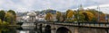 Turin, Italy - Nov 09, 2021: Panoramic view of the western bank of the Po River, the Vittorio Emanuele I bridge, the church of
