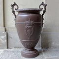 Turin, Italy - september 2020: large bronze vase with the coat of arms of the Savoy family in the royal palace