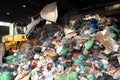 Turin, Piedmont Italy-03 24 2005-Bulldozer move pile of waste in a landfill