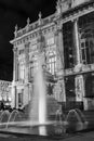 Turin, Piedmont, Italy. Night view of piazza castello in black and white with madama palace behind the fountain Royalty Free Stock Photo